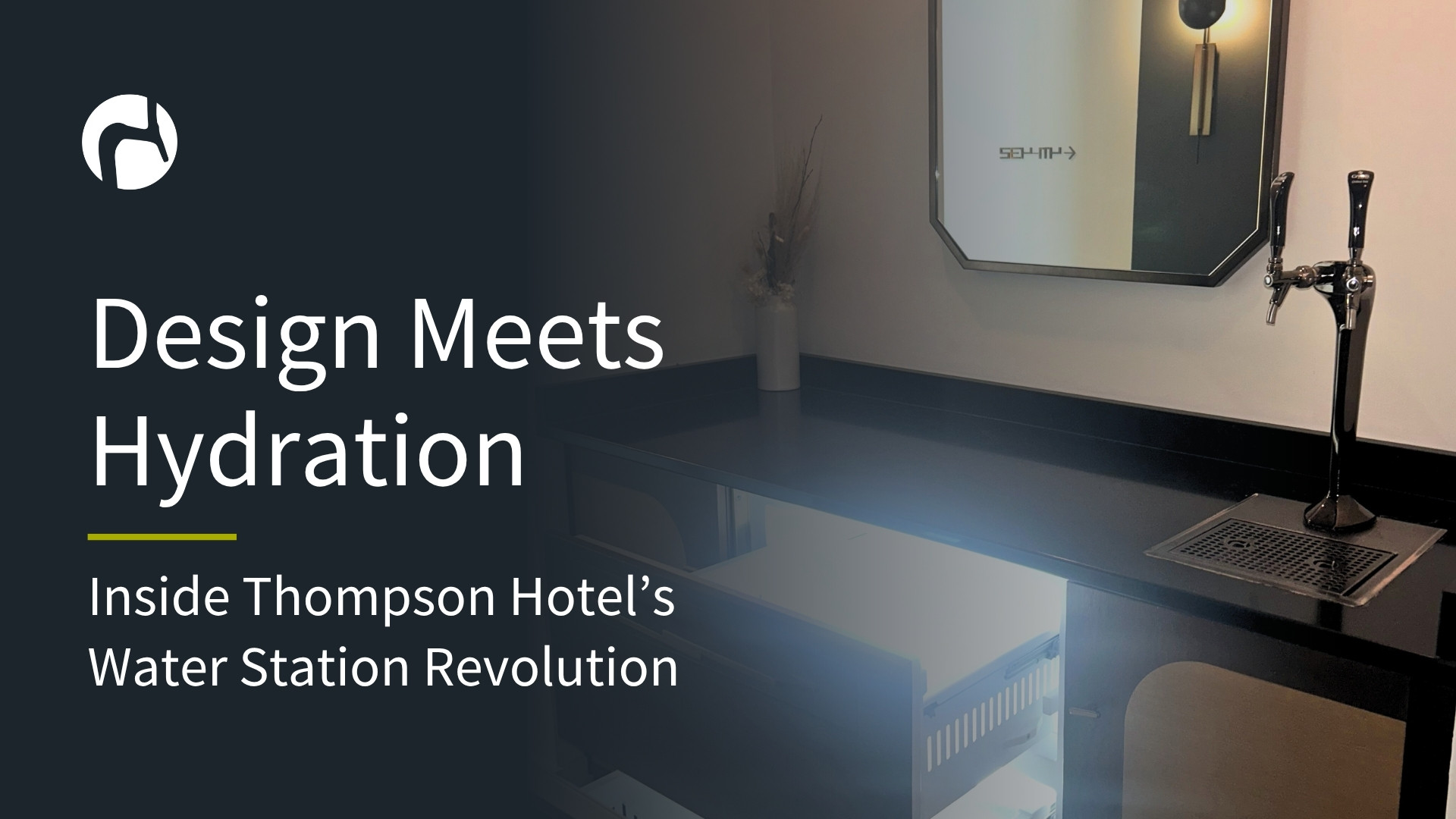 Crysalli water dispenser installed in a hotel hallway with sleek design and ambient lighting.